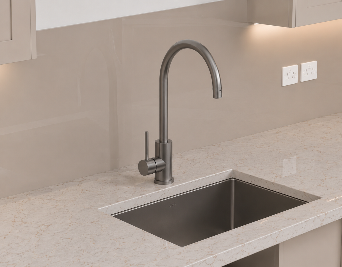 PVD Kitchen Goose Neck Mixer Tap Gun Metal installed at a kitchen sink